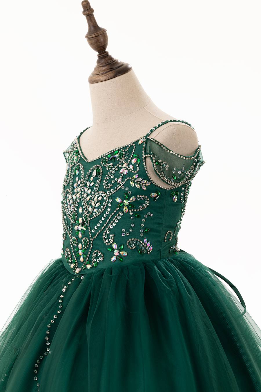 EMERALD GREEN BALL GOWN FOR GIRLS WITH A DROPDOWN SHOULDER STRAP. EMBELLISHED WITH RHINESTOENS, DRAPING SHOULDER STRAP