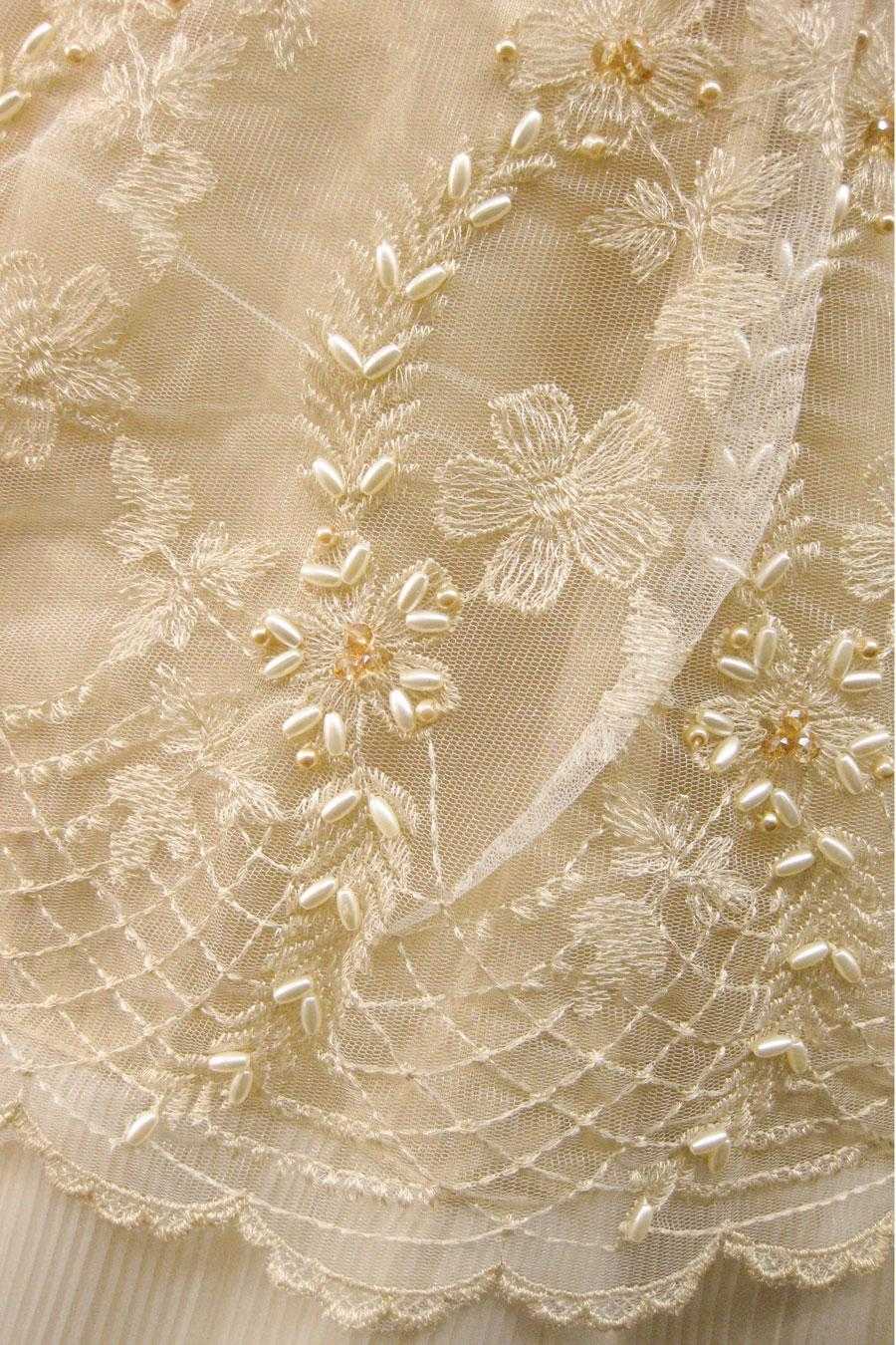 Girl's dark ivory baptism fabric texture , pearl beading