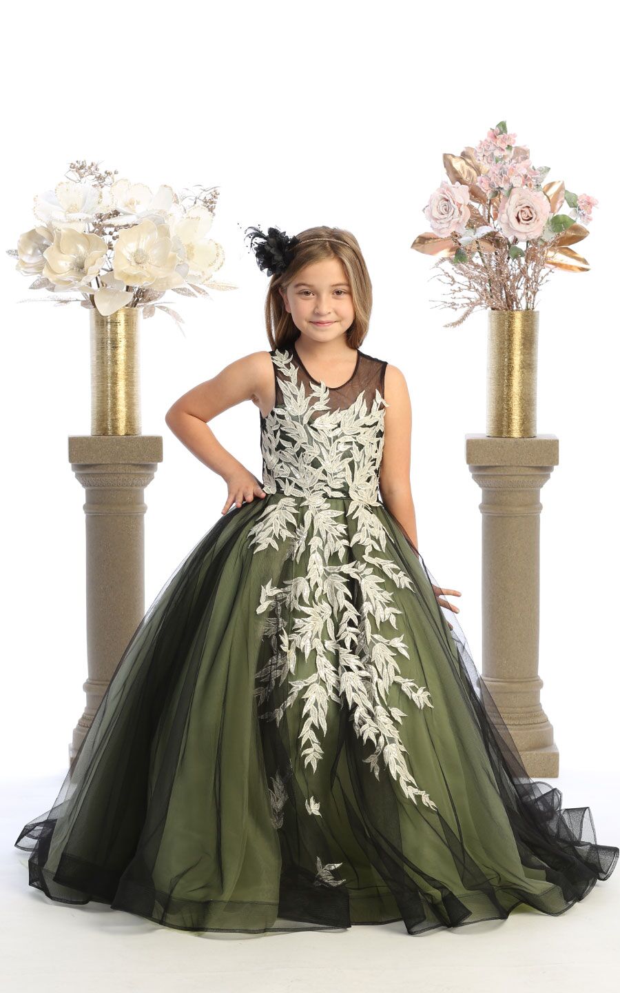 sage with black dress with train and champagne leaves and buttoned back closure